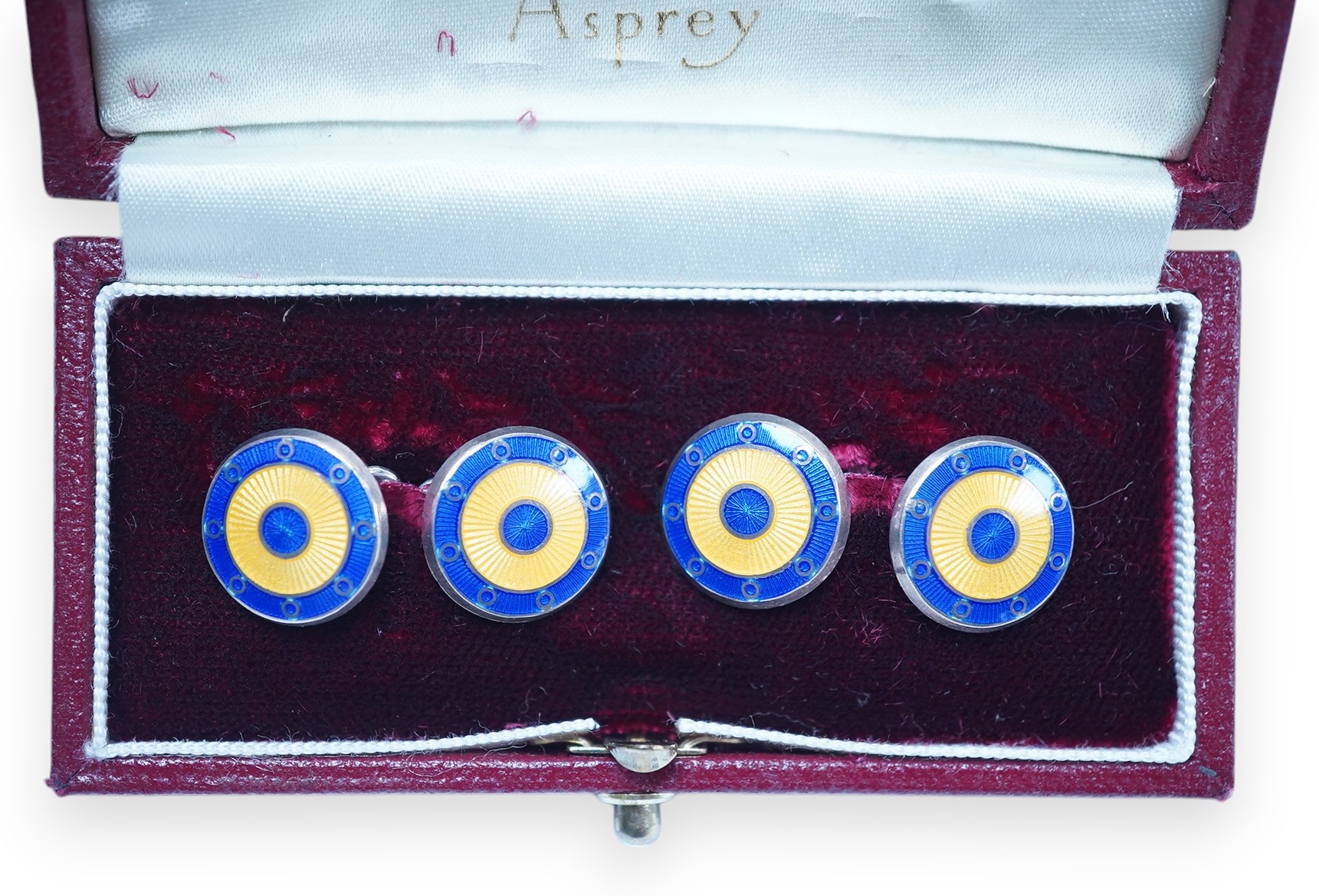 A modern pair of Asprey silver and two colour enamel set target disc cufflinks, in original Asprey box, 14mm. Condition - fair to good